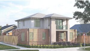 Contemporary double-storey brick house with garage and landscaped front yard in Australia