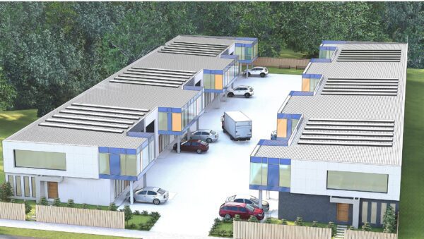 Modern warehouse design with multiple loading bays and green spaces.